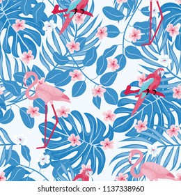 Tropical seamless pattern with toucan, flamingo and tropical leaves.