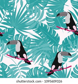 Tropical seamless pattern with toucan, flowers and leaves. Beautiful background with tropical leaves and flowers. Birds of the jungle. For covers, paper, wallpaper and fabric.