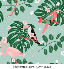 Tropical seamless pattern with toucan, flowers and leaves. Beautiful background with tropical leaves and flowers. Birds of the jungle. For covers, paper, wallpaper and fabric.