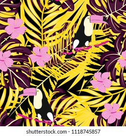 Tropical seamless pattern with toucan, flowers and leaves. A tropical forest with birds. Stylish tropical background with toucan.