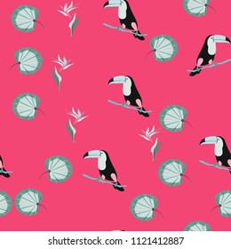 Tropical seamless pattern with toucan, flowers and leaves. Beautiful background with tropical leaves and flowers. Birds of the jungle. For covers, paper, wallpaper and fabric.