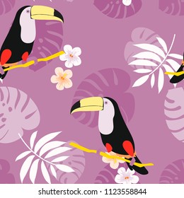 Tropical seamless pattern with toucan, flowers and leaves. Beautiful background with tropical leaves and flowers. Birds of the jungle. For covers, paper, wallpaper and fabric.