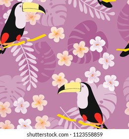 Tropical seamless pattern with toucan, flowers and leaves. Beautiful background with tropical leaves and flowers. Birds of the jungle. For covers, paper, wallpaper and fabric.