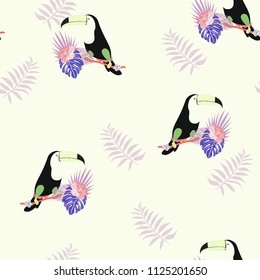 Tropical seamless pattern with toucan, flowers and leaves. Beautiful background with tropical leaves and flowers. Birds of the jungle. For covers, paper, wallpaper and fabric.