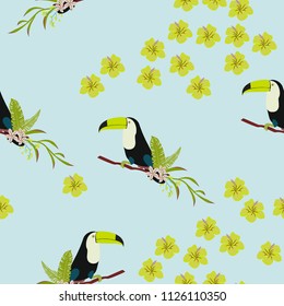 Tropical seamless pattern with toucan, flowers and leaves. A tropical forest with birds. Stylish tropical background with toucan.