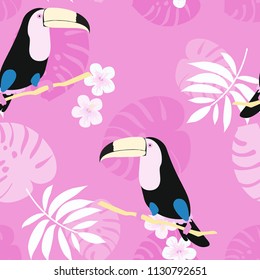 Tropical seamless pattern with toucan, flowers and leaves. Beautiful background with tropical leaves and flowers. Birds of the jungle. For covers, paper, wallpaper and fabric.