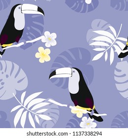 Tropical seamless pattern with toucan, flowers and leaves. A tropical forest with birds. Stylish tropical background with toucan.