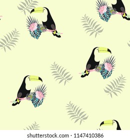 Tropical seamless pattern with toucan, flowers and leaves. Beautiful background with tropical leaves and flowers. Birds of the jungle. For covers, paper, wallpaper and fabric.