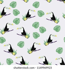 Tropical seamless pattern with toucan, flowers and leaves. A tropical forest with birds. Stylish tropical background with toucan.