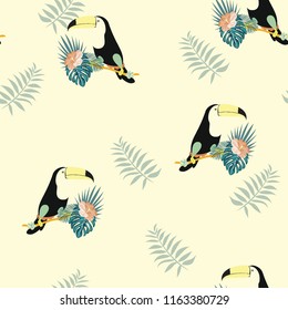 Tropical seamless pattern with toucan, flowers and leaves. Beautiful background with tropical leaves and flowers. Birds of the jungle. For covers, paper, wallpaper and fabric.