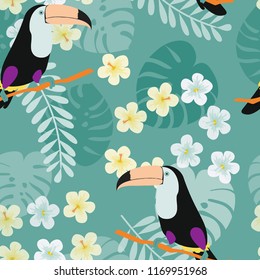 Tropical seamless pattern with toucan, flowers and leaves. A tropical forest with birds. Stylish tropical background with toucan.