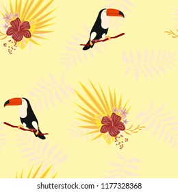 Tropical seamless pattern with toucan, flowers and leaves. Beautiful background with tropical leaves and flowers. Birds of the jungle. For covers, paper, wallpaper and fabric.