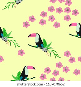 Tropical seamless pattern with toucan, flowers and leaves. Beautiful background with tropical leaves and flowers. Birds of the jungle. For covers, paper, wallpaper and fabric.