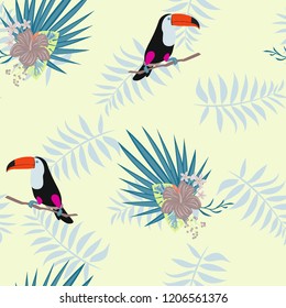 Tropical seamless pattern with toucan, flowers and leaves. Beautiful background with tropical leaves and flowers. Birds of the jungle. For covers, paper, wallpaper and fabric.