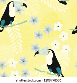 Tropical seamless pattern with toucan, flowers and leaves. A tropical forest with birds. Stylish tropical background with toucan.