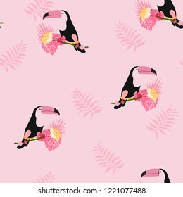 Tropical seamless pattern with toucan, flowers and leaves. Beautiful background with tropical leaves and flowers. Birds of the jungle. For covers, paper, wallpaper and fabric.