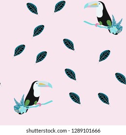 Tropical seamless pattern with toucan, flowers and leaves. Beautiful background with tropical leaves and flowers. Birds of the jungle. For covers, paper, wallpaper and fabric.