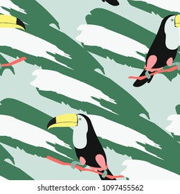 Tropical seamless pattern with toucan and leaves. Beautiful tropical leaves. Background with birds of the jungle for paper, covers, fabric.