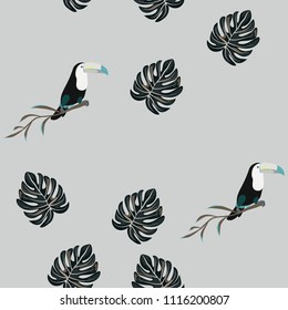 Tropical seamless pattern with toucan and leaves. Beautiful tropical leaves. Background with birds of the jungle for paper, covers, fabric.