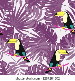 Tropical seamless pattern with toucan. Tropical leaves with exotic birds.