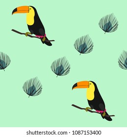 Tropical seamless pattern with toucan and tropical plants. Summer tropical background. Tropical pattern for fabric and covers. Pattern with birds.