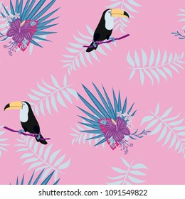 Tropical seamless pattern with toucan and plants. Leaves of palm, monstera. Background with tropical birds.