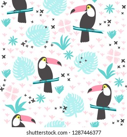 Tropical seamless pattern with toucans, exotic leaves. Vector illustration