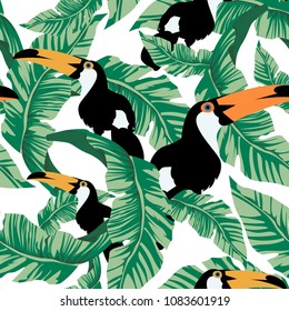 Tropical seamless pattern with toucans and leafs.Summer vector exotic background.Colorful textile texture