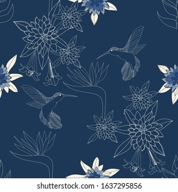 Tropical seamless pattern with tropic flowers in blue shades and hummingbird outline in beige colour on blue background.