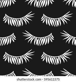 Tropical seamless pattern with white palm leaves on black background