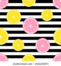 Tropical seamless pattern with yellow and pink lemons slices. Vector bright print for fabric or wallpaper.