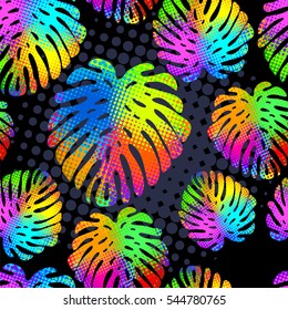 Tropical seamless vector pattern in fashion, trend color palette. Hand-drawn fantastic multicolor leaves a black background