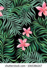 Tropical seamless vector pattern with jungle leaves and exotic flowers. Summer background for print design.