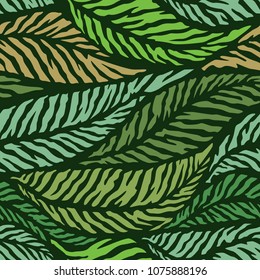 Tropical summer palm tree leaves in a seamless pattern .