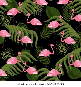 Tropical summer pattern with palm leaves and flamingos.Abstract,vintage,exotic,jungle background.For textile,texture,fabric,prints,t-shirt graphic,wallpaper and decor design.Vector illustration.