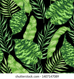 Tropical summer seamless pattern with green palm leaves on a black background. Hand drawn vector illustration