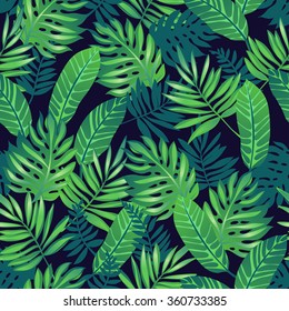 Tropical trendy seamless pattern with exotic palm leaves.