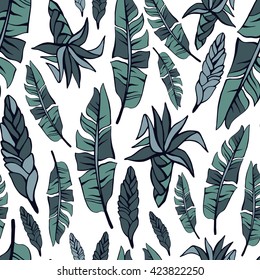 Tropical trendy seamless pattern with exotic leaves and flowers
