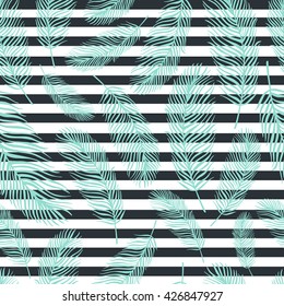 Tropical trendy seamless pattern with exotic palm leaves