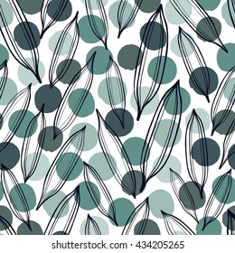 Tropical trendy seamless pattern with exotic palm leaves on a polka dot background.