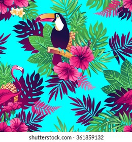 Tropical trendy seamless pattern with toucans, flamingos, exotic flowers and leaves.