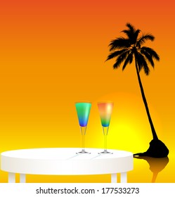 Tropical trip concept ; sunset landscape with two cocktails