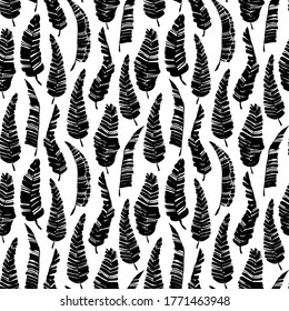 Tropical vector banana leaves seamless pattern. Black and white brush black paint banana leaves. Exotic abstract background. Ink illustration of tropical palm. Hand drawn ink texture with foliage. 