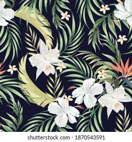 Tropical vector pattern with palm leaves, hibiscus flowers and frangipani. Botanical seamless print. Summer illustration.