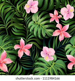 Tropical vector pattern	
Seamless hand drawn exotic  with green palm leaves and hibiscus flower.Stock vector.
