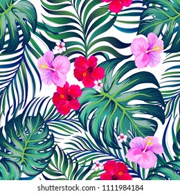 Tropical vector pattern	
Seamless hand drawn exotic  with green palm leaves and hibiscus flower.Stock vector.