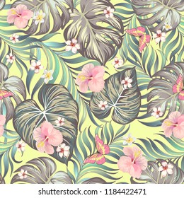 	
Tropical vector seamless background. Jungle pattern with flowers, monstera and palm leaves. Stock vector.