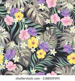 	
Tropical vector seamless background. Jungle pattern with flowers, monstera and palm leaves. Stock vector.