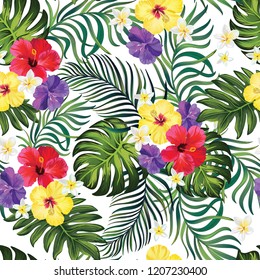 Tropical vector seamless background. Jungle pattern with flowers, monstera and palm leaves. Stock vector.