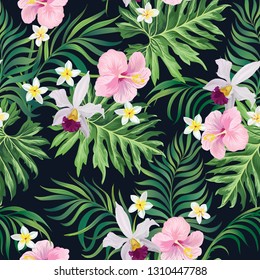 	
Tropical vector seamless background. Jungle pattern with flowers, monstera and palm leaves. Stock vector.